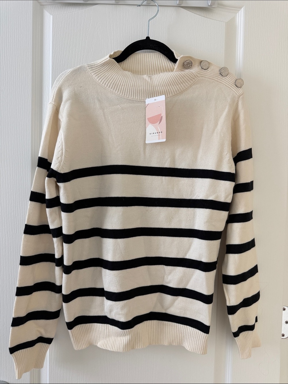 Button-Shoulder Striped Crewneck Sweater in Cream and Black